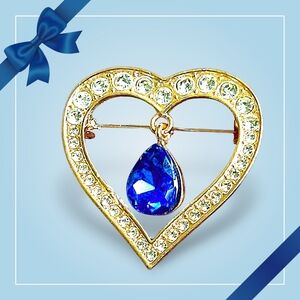 Rose Gold Tone Heart Brooch with Blue Rhinestone